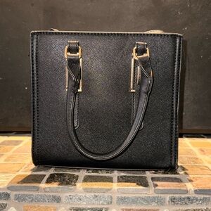Small black handbag with strap